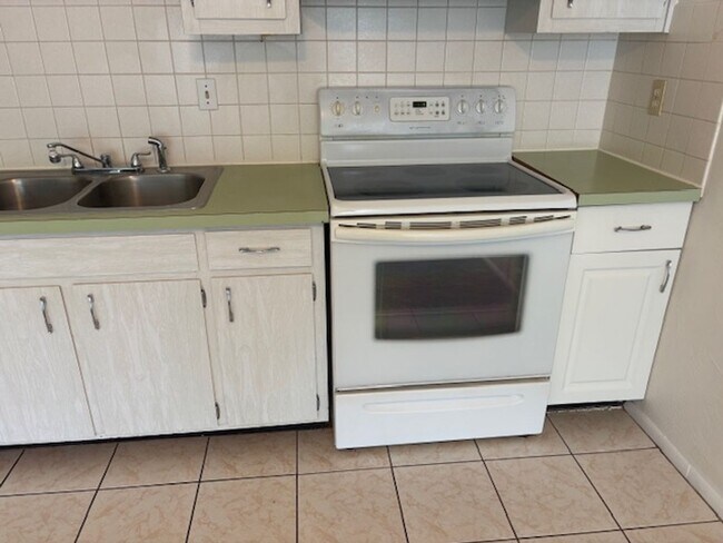 Building Photo - 55+, quaint 2/1 in a great community locat...