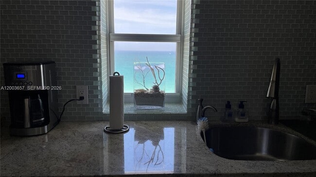 Building Photo - 5701 Collins Ave