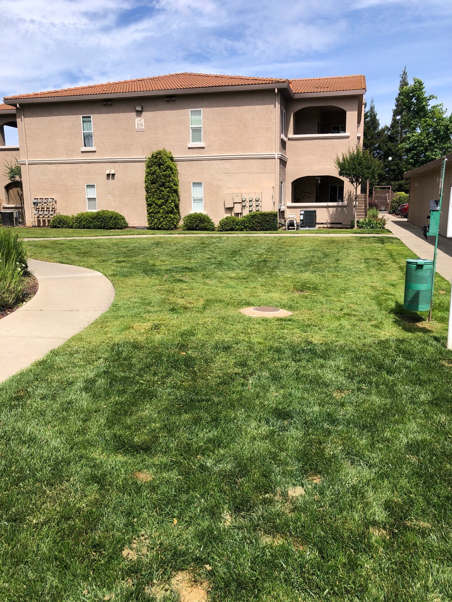 Lots of grass areas with pet stations. - 10001 Woodcreek Oaks Blvd