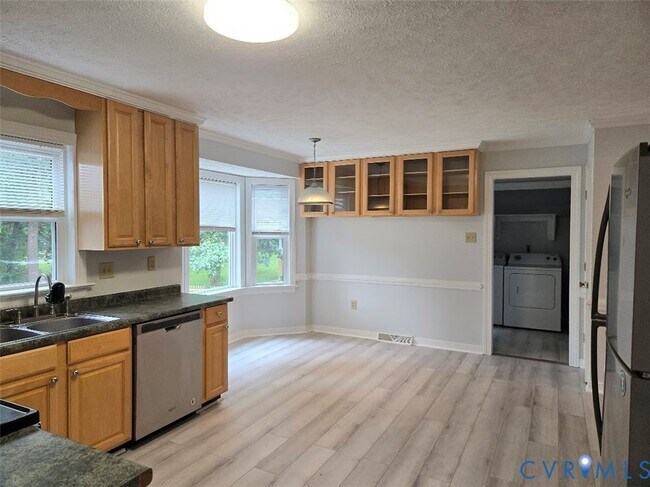Building Photo - 8312 Soft Wind Dr