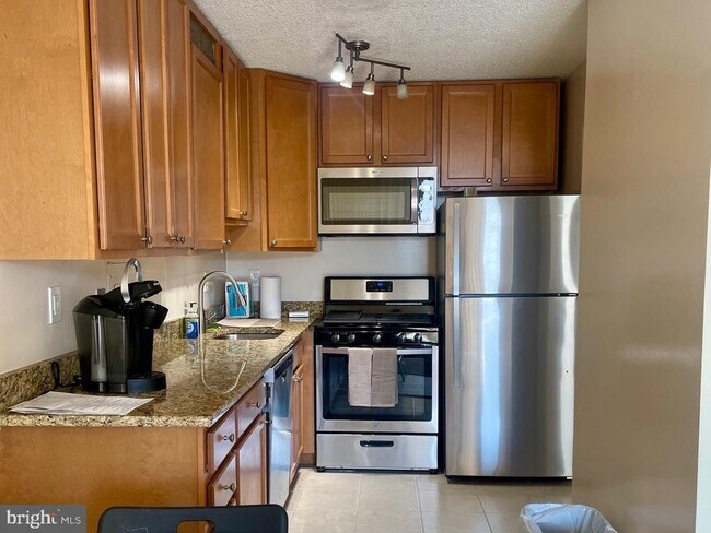 Building Photo - 5225 Pooks Hill Rd