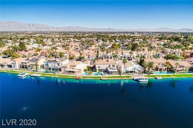 Building Photo - Vegas's Only Available Waterfront Rental ~ 4 Bedroom Desert Shores Lake Front Home