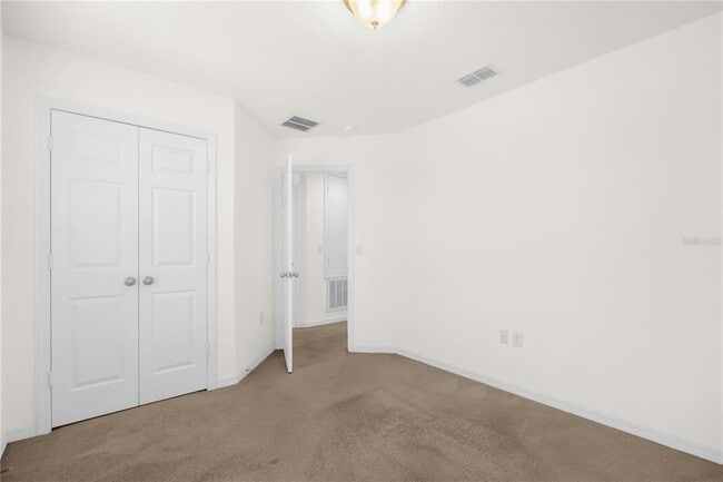 Building Photo - 8130 Red Stopper Ln