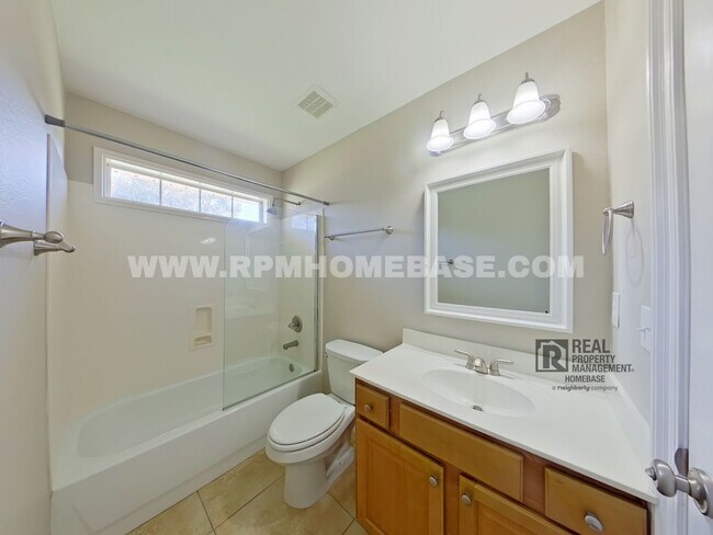 Building Photo - ELEGANT 4/3 + OFFICE IN GATED CHANAN ESTATES | Gas Fireplace + Formal Dining!