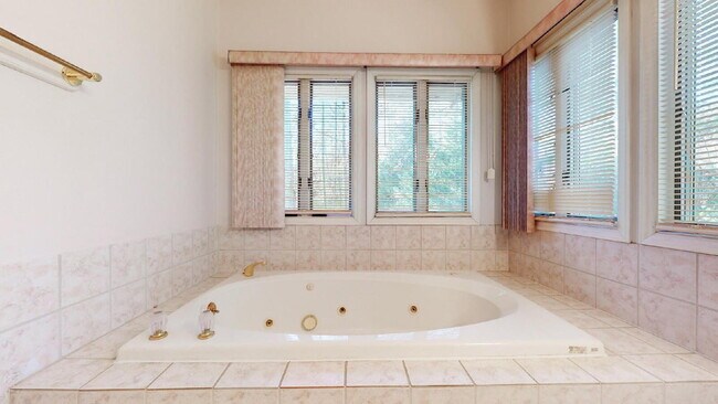 Building Photo - The Mylandia | Beautiful and spacious University City – Charlotte house with a backyard, offering...