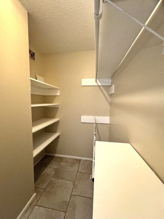 Building Photo - Single-level living on ground floor  |  Fresh paint (July 2026)  |  2 carports  |  Community Pool...