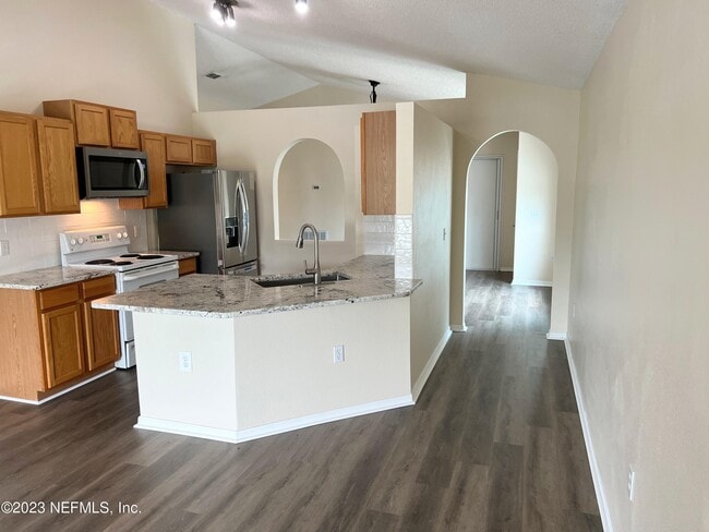 Building Photo - 6580 Gentle Oaks Dr N