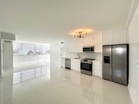 Building Photo - Fully Renovated East-Facing 2BR/2BA + Bonus Room | Ocean Views | In-Unit W/D