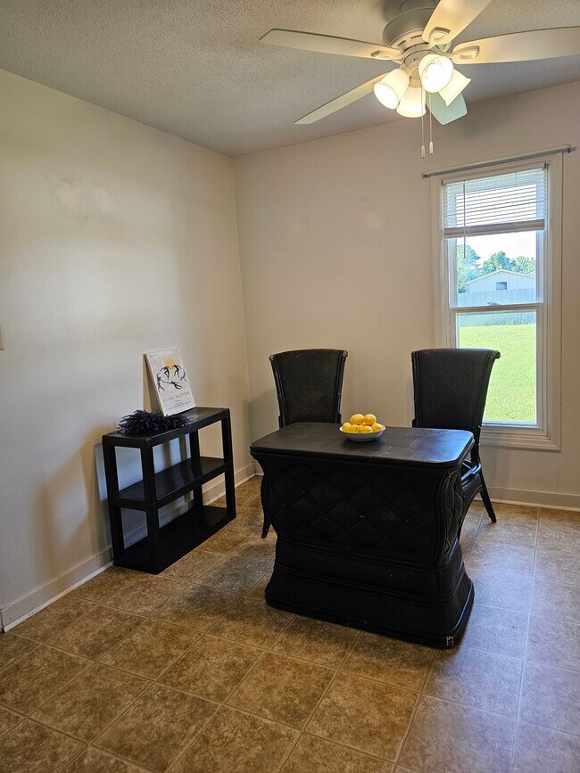 Dining area with view of backyard - 404 Rams Rd