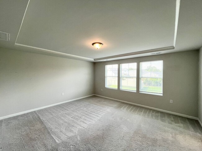 Building Photo - Newly Built 4BD, 3.5BA Zebulon Home with a First Floor Bedroom and Screened Patio in an HOA Commu...