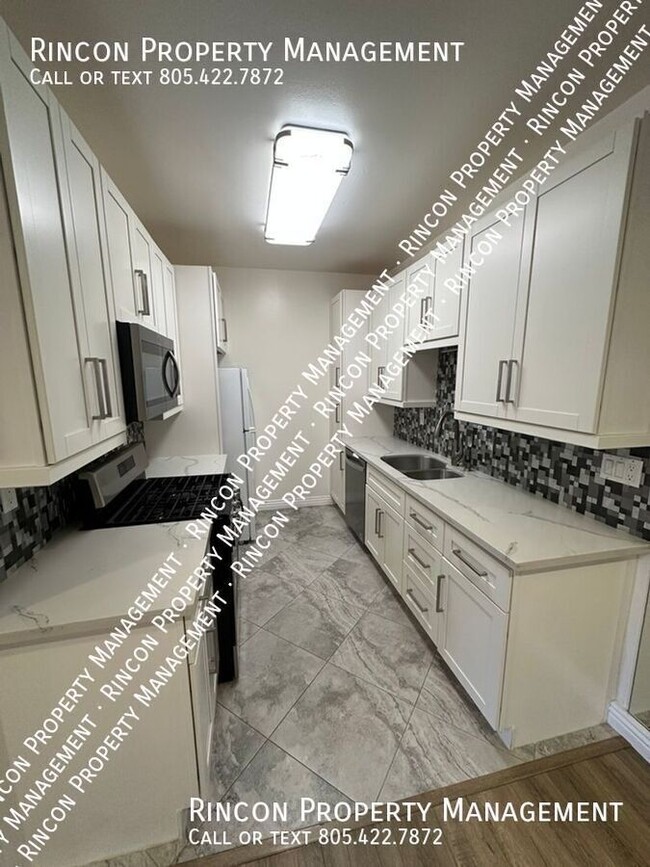 Building Photo - **$500 OFF ONE MONTH'S RENT**Casa De Oaks-...