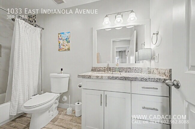 Building Photo - 1033 E Indianola Ave