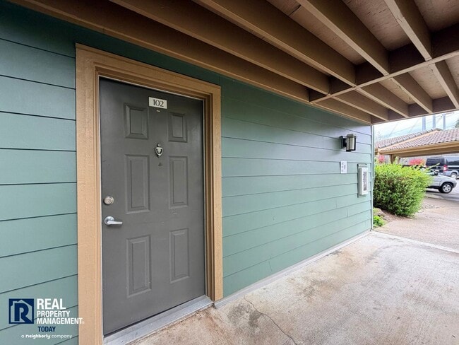 Building Photo - Updated 2 Bed Condo Near the Narrows – Water Views, Covered Parking & Prime Tacoma Location!