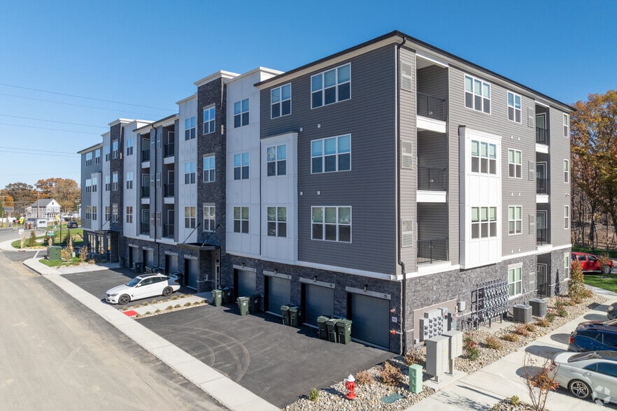 Building Photo - Camelot on Main Street - Brand New!