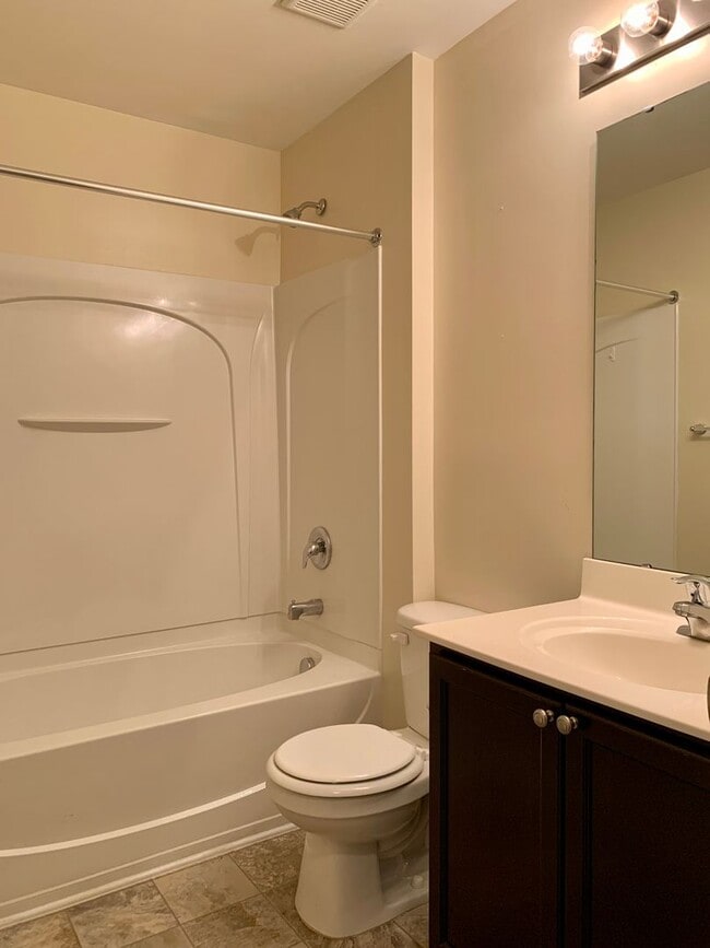 Building Photo - RENT READY Townhome Convenient to I440 & I...