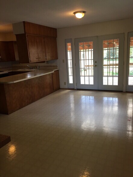 Dining room into kitchen - 628 Johanna Avenue Southeast