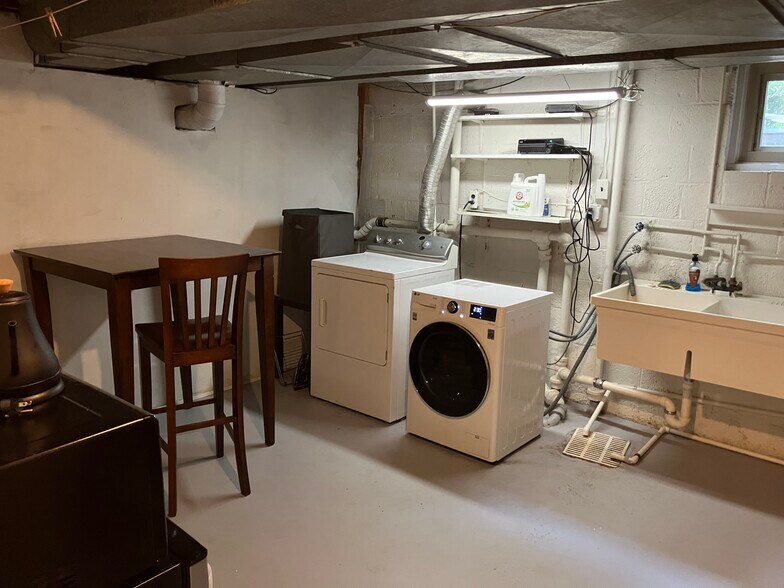New solid wood table and laundry - 3741 4th St N