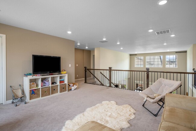 Building Photo - Luxury 4BD, 3.5BA Sterling Ranch Home with...