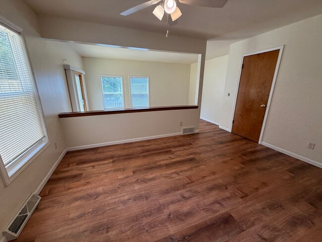 Building Photo - August 15th rent special! New deck! 3 Bedroom, updated kitchen, updated flooring, garage, drivewa...