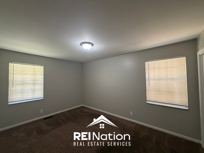 Building Photo - MASSIVE BESSEMER RENTAL! 4BR/2.5BA | High Ceilings & Brick Fireplace | 2-Car Garage!
