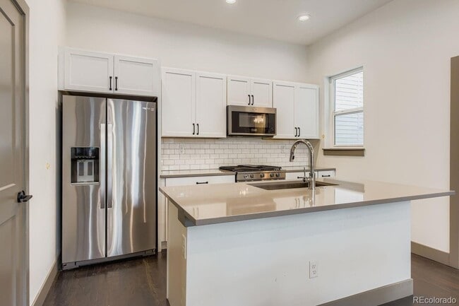 Building Photo - 1280 E Hampden Ave