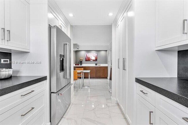 Building Photo - 5555 Collins Ave