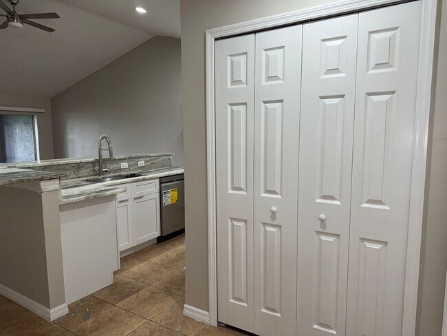 Building Photo - Experience this Cape Coral 3 bedroom 2 bath corner duplex with 1 car garage and screened in lanai.