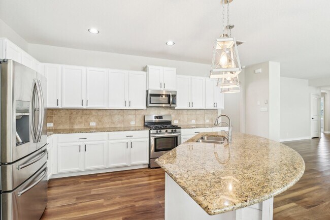 Building Photo - "Charming 4-Bedroom Oasis with custom fini...