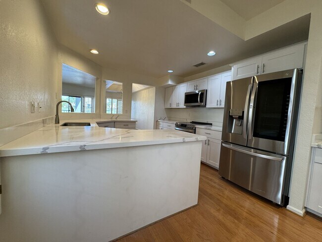 Building Photo - LUXURY LAKEFRONT GAINEY RANCH TOWNHOME WITH GOLF COURSE VIEWS – RESORT STYLE SCOTTSDALE LIVING!