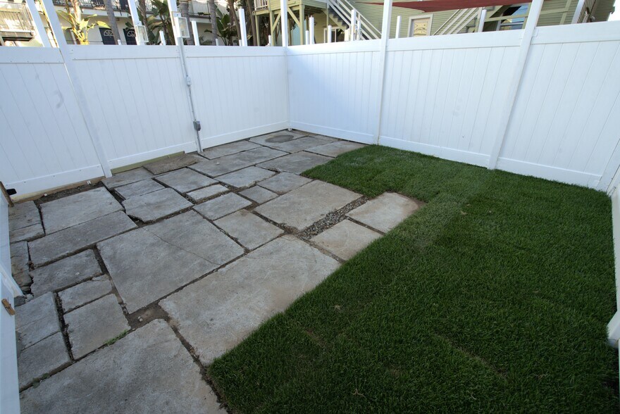 Private fenced backyard only for this unit's use - 1123 E Ocean Blvd