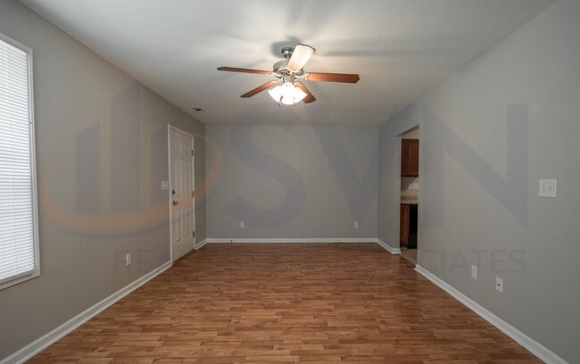 Building Photo - Welcome to this spacious 4-bedroom, 2.5-ba...