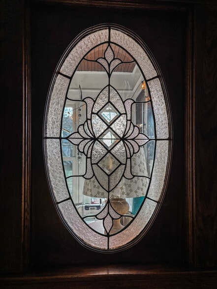 Entryway with beautiful, historic leaded glass. - 819 Edmund Ave