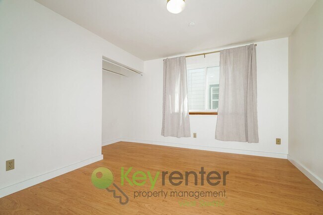 Building Photo - Remodeled Two-Bedroom with Open Floor Plan...