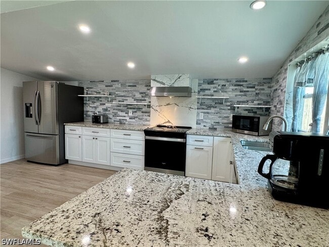 Building Photo - 829 107th Ave N