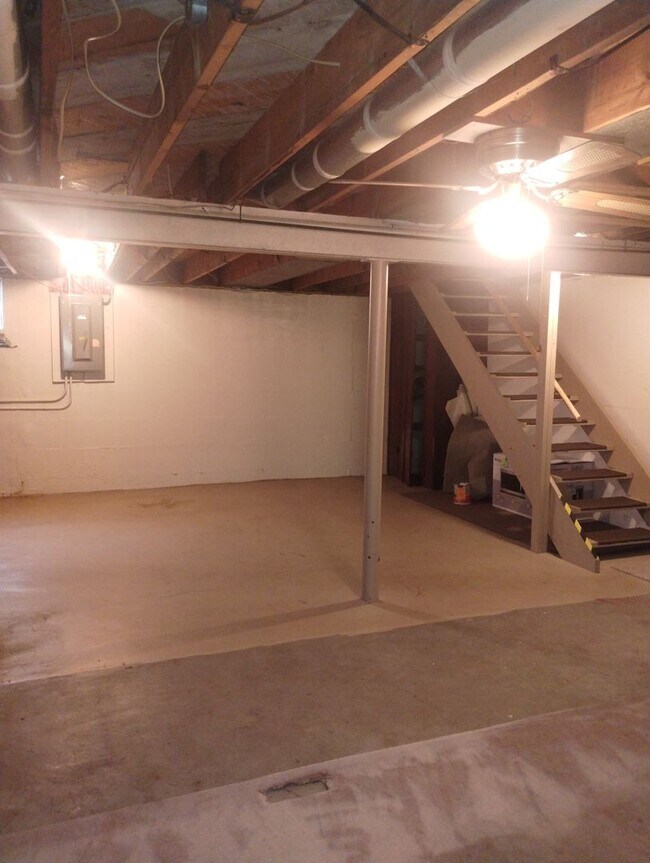 Building Photo - Quaint Duplex with a private Basement, Garage Space & Patio