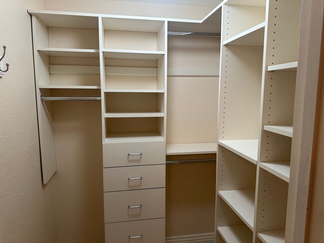 Building Photo - Spacious Millcreek Townhome with Two Living Areas, Private Deck & Community Amenities