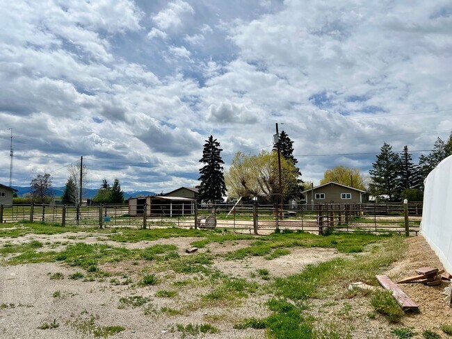 Building Photo - Pet Friendly 2 Bed 2 Bath Single Family Home With Garage, Private Deck and Big Yard!