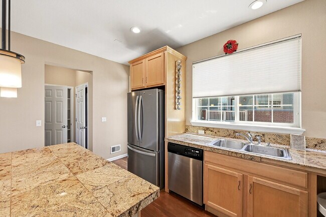 Building Photo - $2,640.95 -  3 Bed, 2.5 Bath Townhome in Denver with Attached Garage and Central AC!