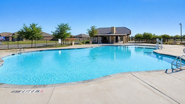 Building Photo - Practically New Home with Parks, Pools, Amazing Community!