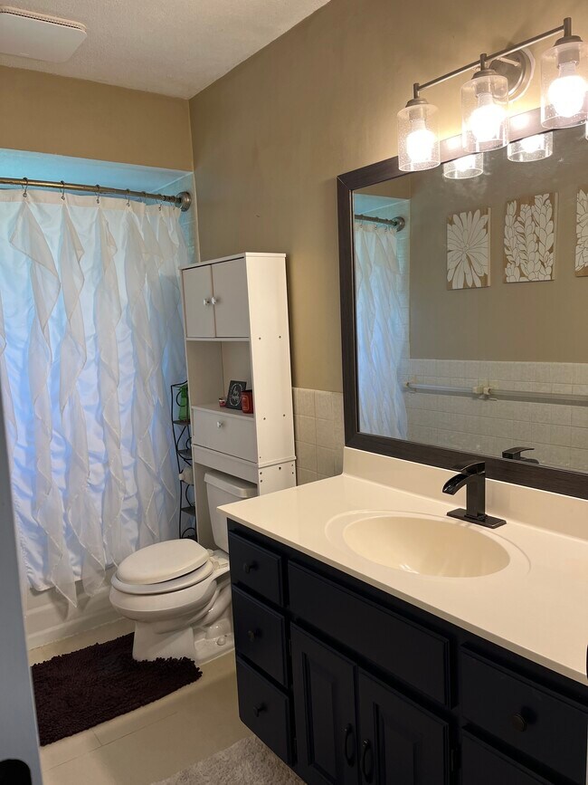 Bathroom positioned near bedrooms - 620 114th Ln NE