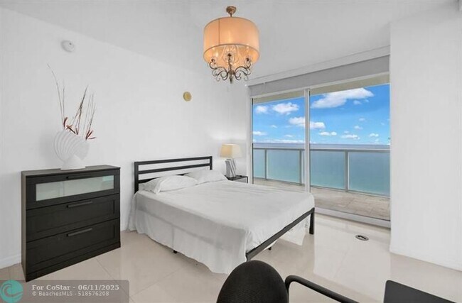 Building Photo - 16699 Collins Ave