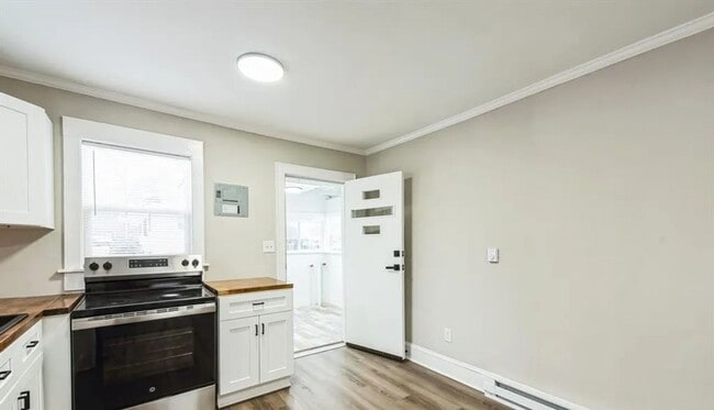 Building Photo - Welcome to this Beautiful Newly Renovated ...