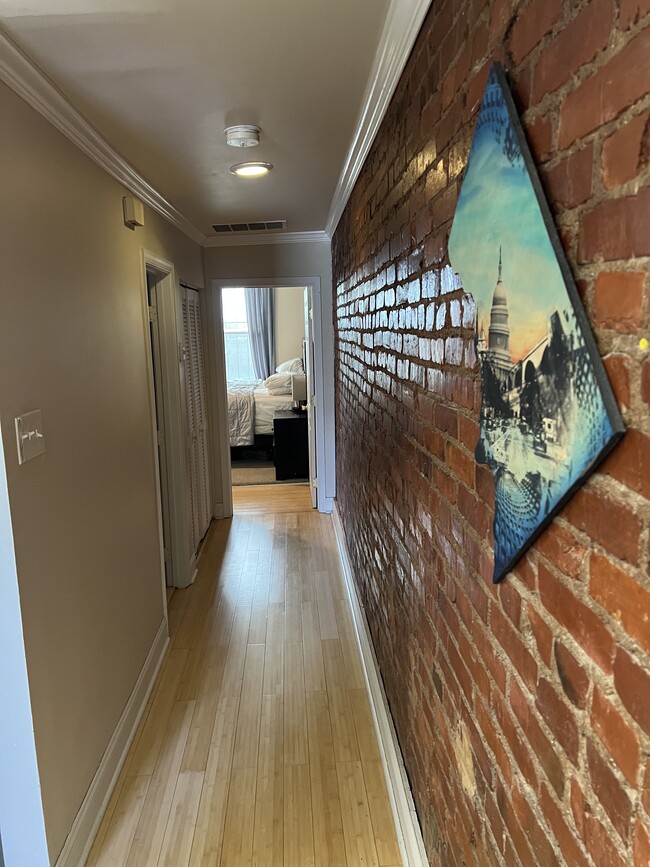 Exposed brick hallway - 712 13th Street Northeast