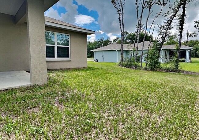 Building Photo - 8547 N Tiny Lily Dr