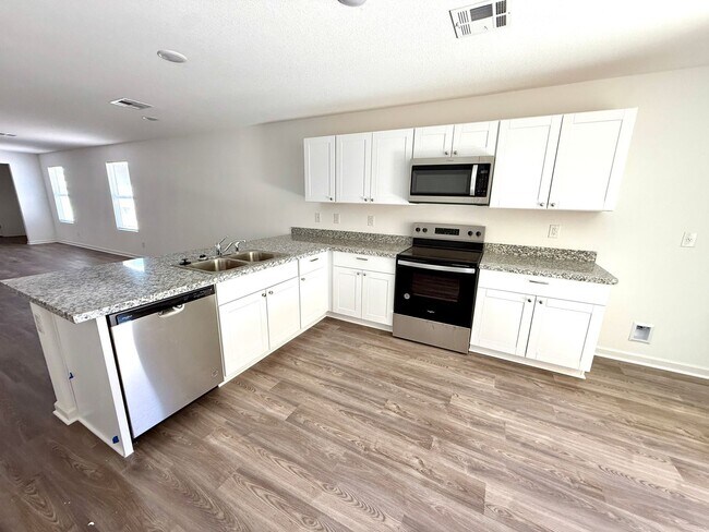 Building Photo - Beautiful 2024 Build 3 Bedroom Home- Move In Special! $800 off 1st Month's Rent. $300 off 2nd and...