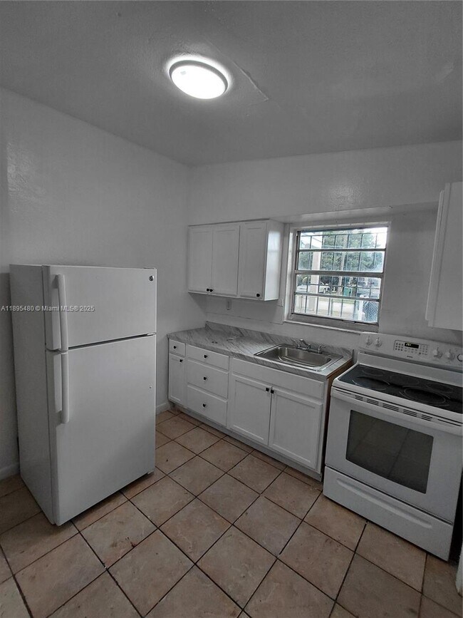 Building Photo - 7051 NW 21st Ave