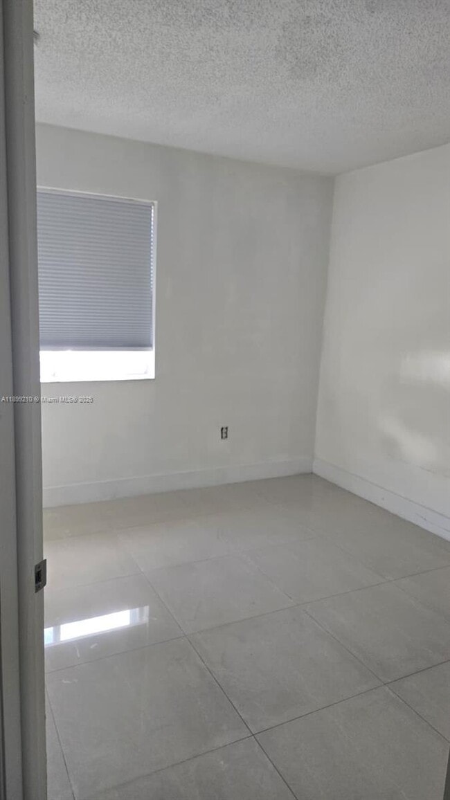 Building Photo - 4768 NW 114th Ave