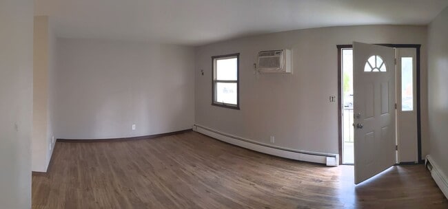 Building Photo - Conveniently located Riverbend Apartments feature a quiet community with a large green space