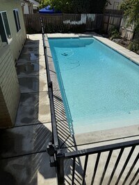 Building Photo - Tracy 4 Bedroom 2 Bathroom Home with a pool
