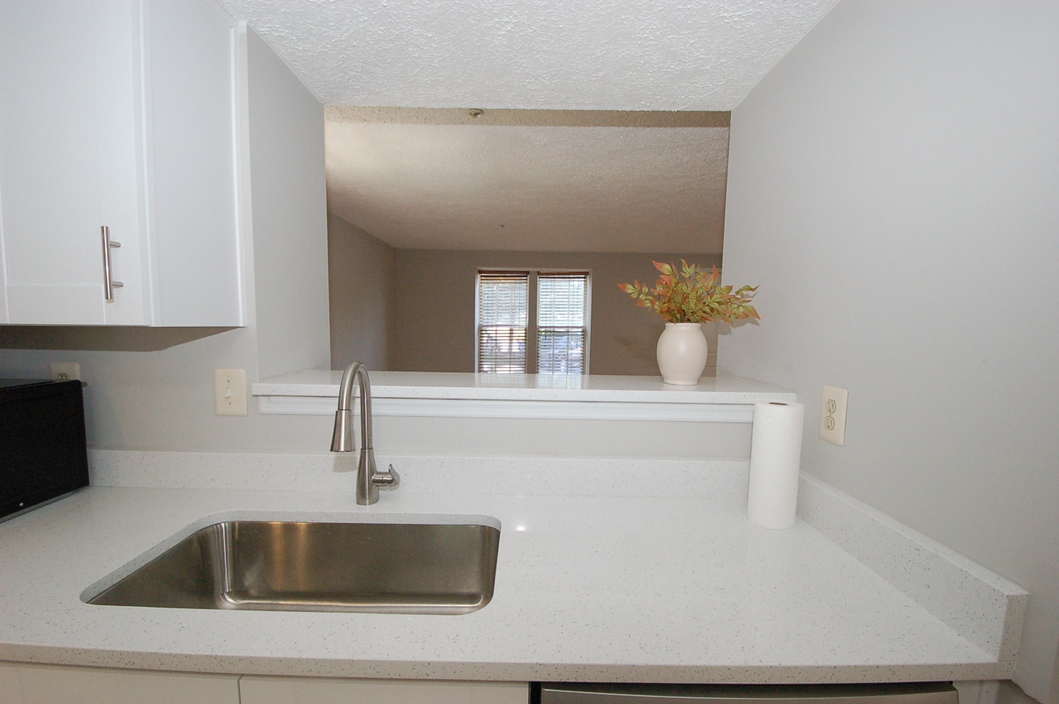 In first floor kitchen looking towards living room - 8916 Pembrook Woods